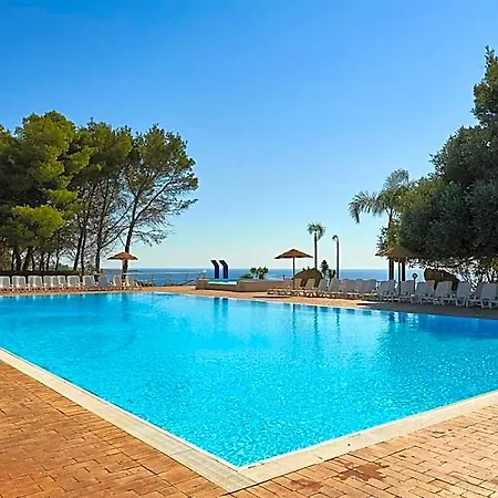 Отель Villaggio L'oasi 4*
