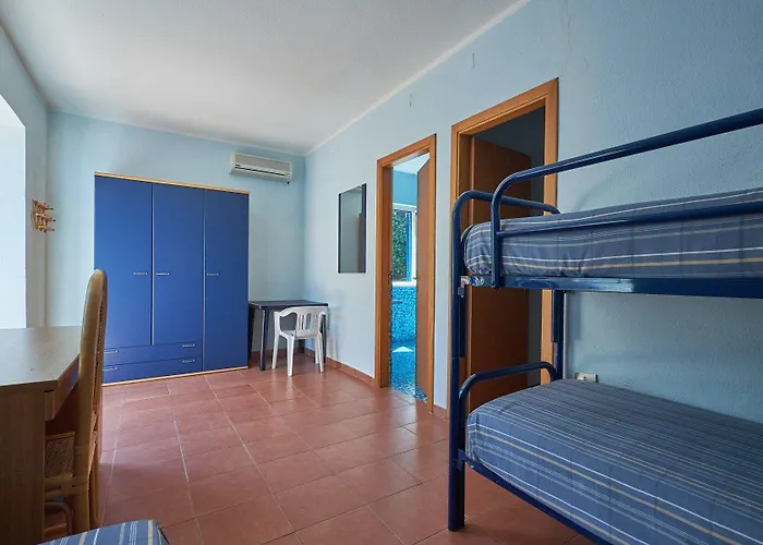 מלון Villaggio L'oasi 4*